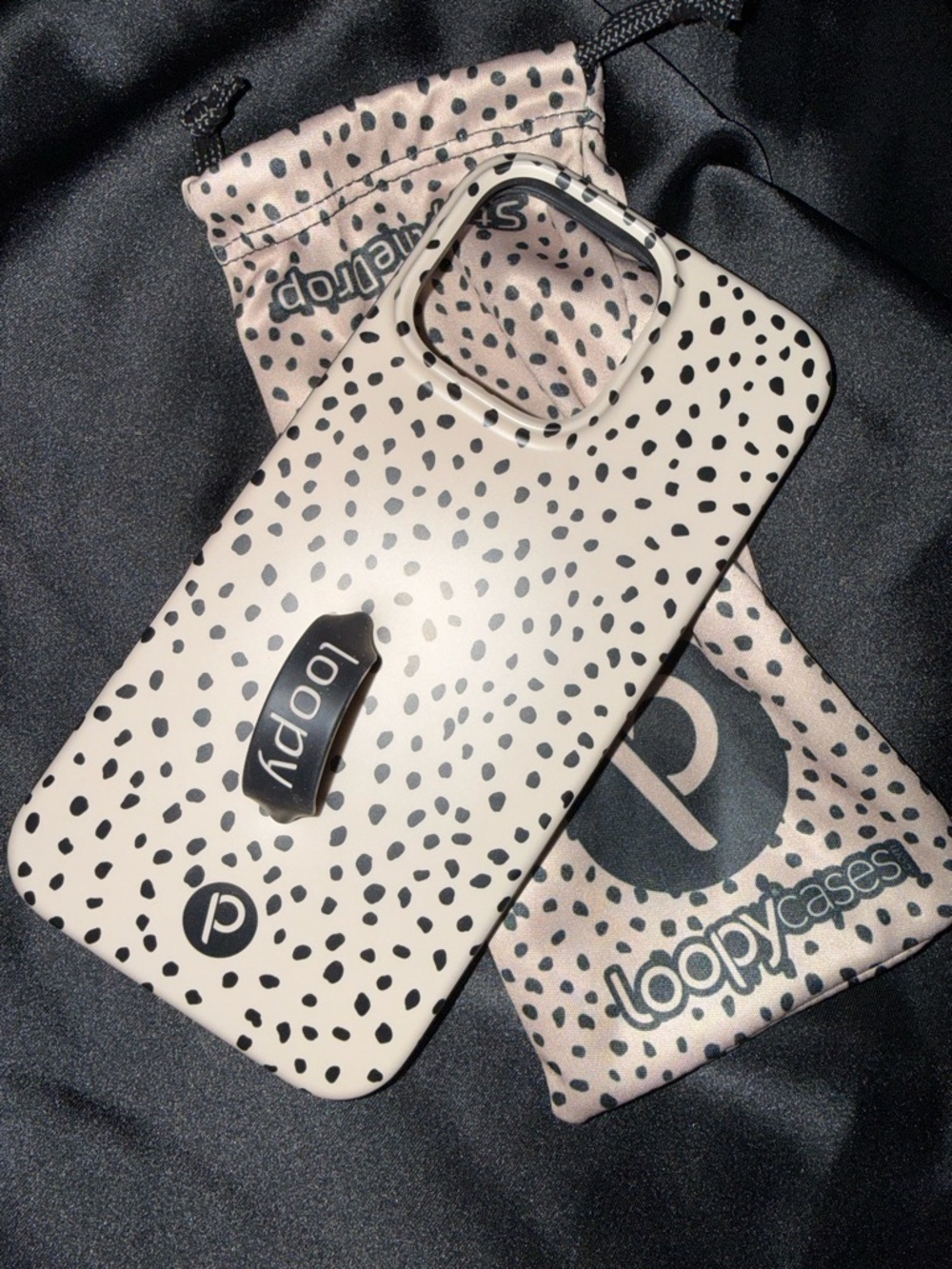 Loopy Case Beige Phone Case with Black Speckled Pattern and Loop